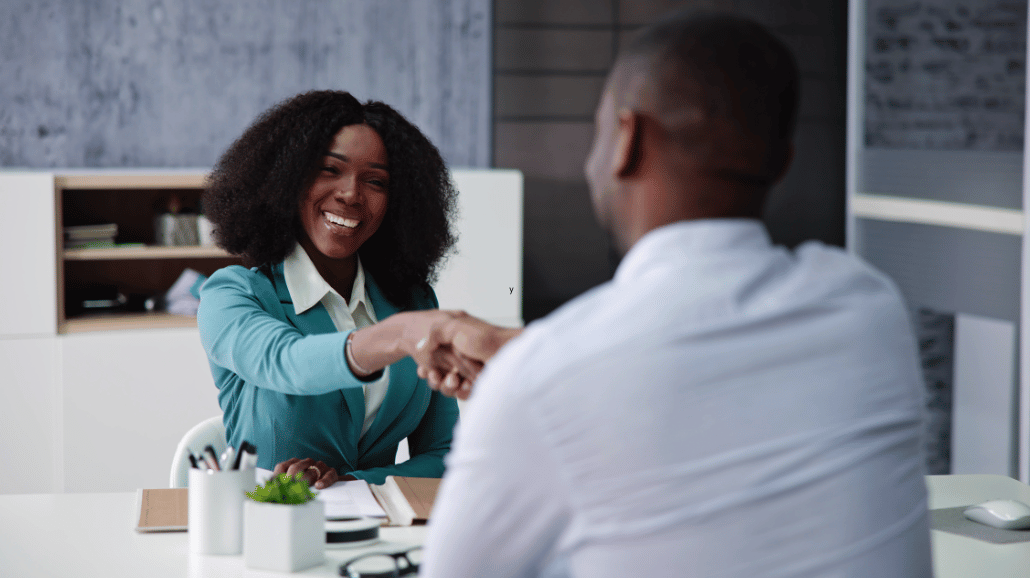 Male businessman interviewing female candidate