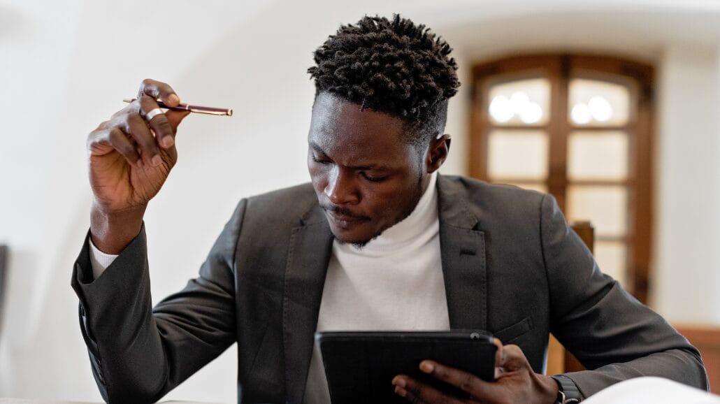 Black entrepreneur reviewing paperwork
